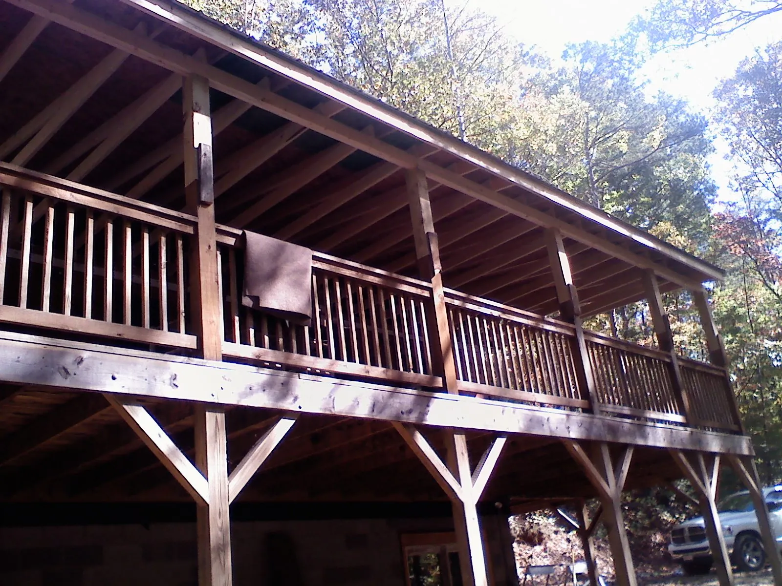 Timber framing under a new elevated porch and deck — Roof Leak Repair in Ladoga by Roofing Brothers